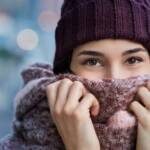 Woman feeling cold in winter